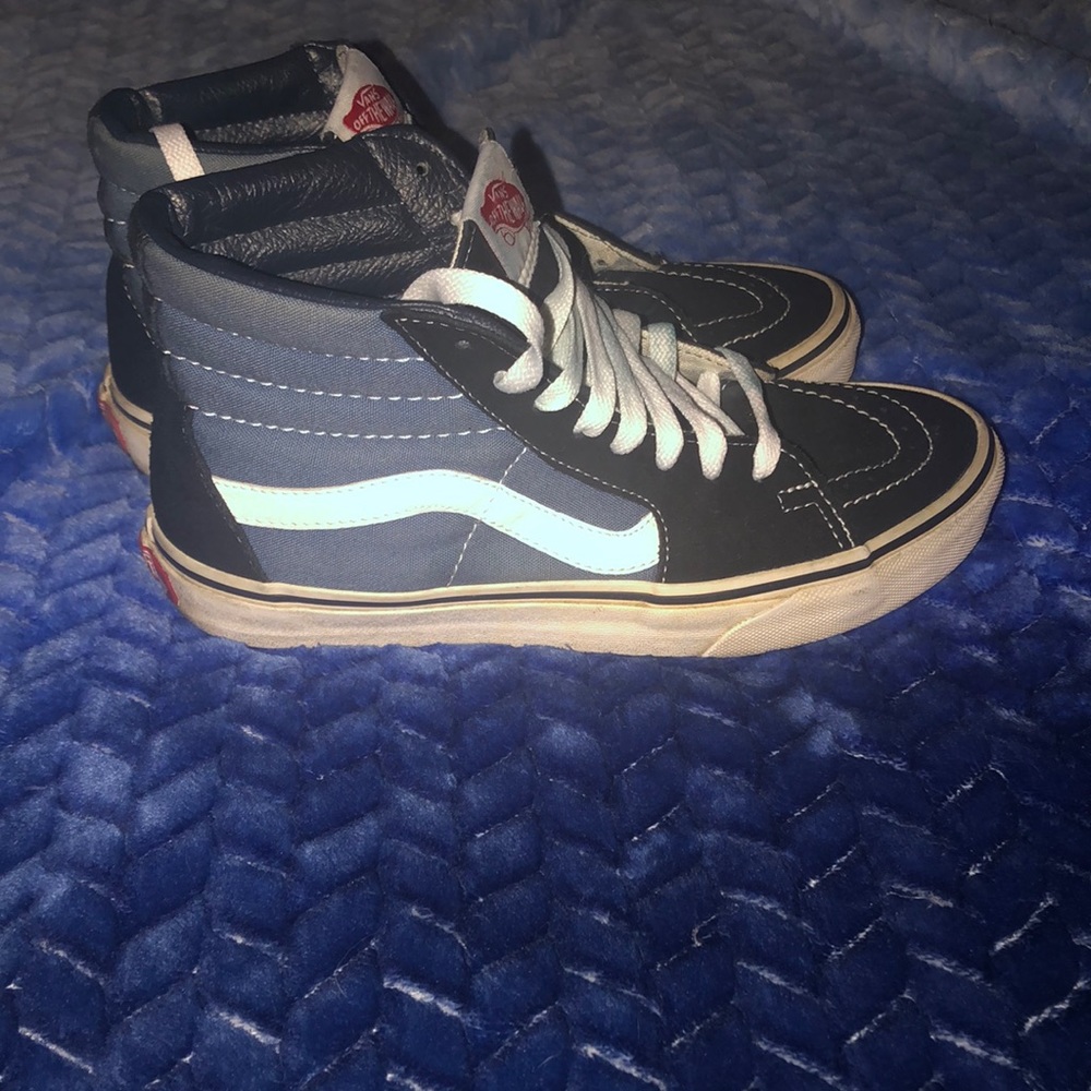 Vans high top tennis shoes sz 7 woman’s 5.5 mens (pre own) will complement jeans